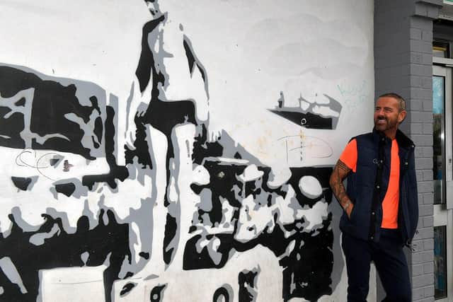 Micky Doherty pictured at the mural of Len Ball in Creggan’s Central Drive. Photo: George Sweeney.  DER2317GS – 41