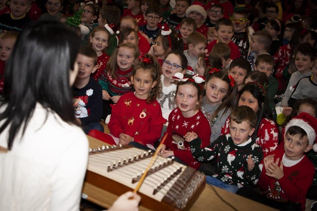 Pupils at Steelstown PS listening to some classical Chinese music.