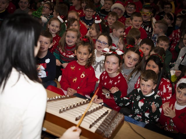 Pupils at Steelstown PS listening to some classical Chinese music.