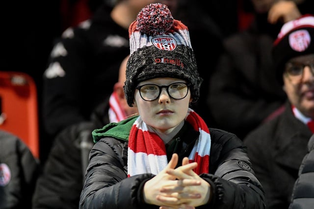 This young Derry City fan is praying for victory at the Presidents Cup final at Brandywell on Friday evening. Photo: George Sweeney. DER2307GS – 71