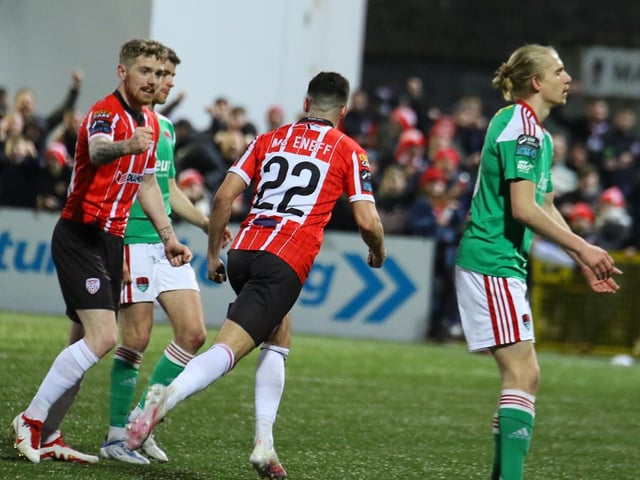 Jordan McEneff celebrates with Jamie McGonigle after scoring Derry's second.