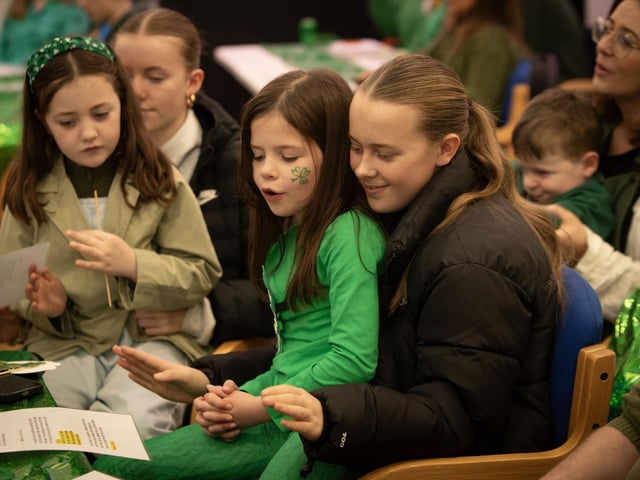 Grandchildren joining in the singing at the Mellow DEEDS Concert on St. Patrick's Day.