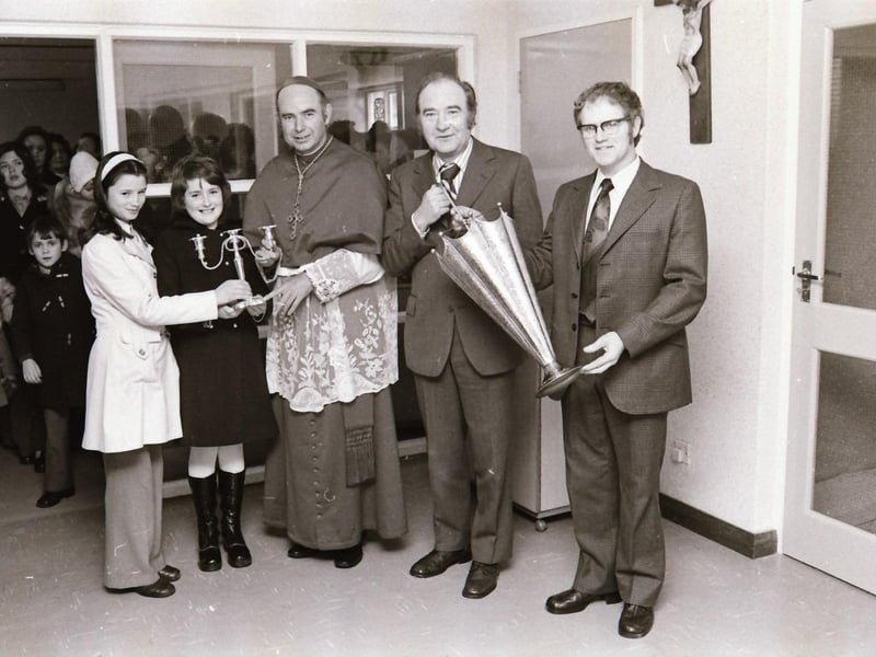 Presentation to Bishop Edward Daly at the opening new Scoil Naomh Brid in Moville.