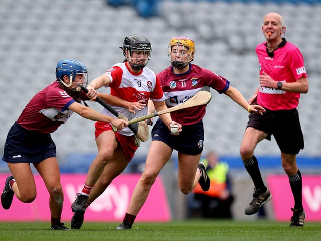 Derry’s Megan Kerr and Jade McKeogh of Westmeath tangle during Sunday's Very Camogie League Division 2A Final in Croke Park. (Photo: INPHO/Ryan Byrne)