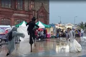 Dancing through the rain at Derry Halloween.