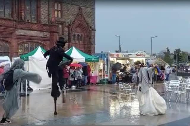 Dancing through the rain at Derry Halloween.