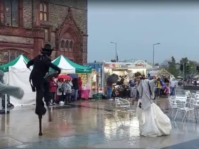 Dancing through the rain at Derry Halloween.