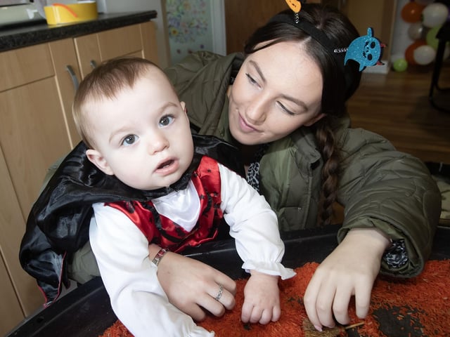 A Mini Count Dracula pictured with mum during last week's Halloween celebrations.