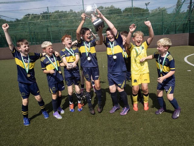 PADRAIG BARTON CUP WINNERS. . . .Don Boscos FC, winners of the Feile's recent Padraig Barton Cup 2025, pictured celebrating a Bay Road. (Photos: Jim McCafferty Photography)