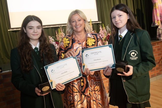 Mrs Juliette Barber presenting Cara Elliott and Ciara Moran with the Overall Achievement at GCSE results during Thursday night's prizegiving in St. Cecilia's College. (Photos: Jim McCafferty Photography)