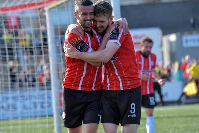 Michael Duffy celebrates with Jamie McGonigle scoring Derry City's third goal against Athlone Town, with Jamie McGonigle. Photo: George Sweeney