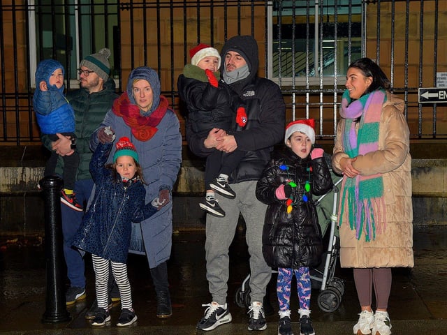 Families pictured at the Derry Christmas procession on Sunday evening last. Photo: George Sweeney. DER2248GS -  19