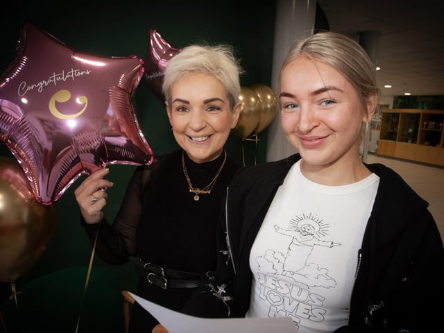 A Level student Bronagh Gallagher is congratulated by her mum Fiona at St. Cecilia's College on Thursday morning. (Photos: Jim McCafferty Photography)
