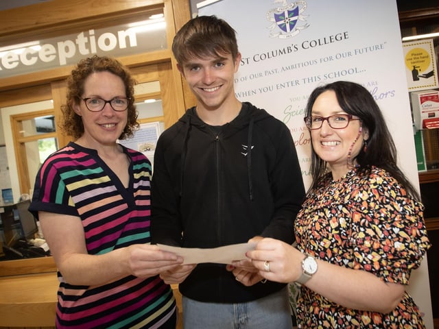 A very happy A Level student James Green pictured at St. Columb's College on Thursday morning with Mrs. Grimley, Vice Principal) and Mrs. McLaughlin, Principal. (Photos: Jim McCafferty Photography)