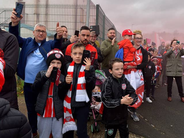 Fans gather at Brandywell Stadium the Saturday morning before the FAI Cup Final to give wish Derry City players and coaches good luck as they depart for Dublin to face Shelbourne. Picture by George Sweeney