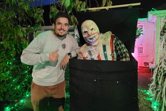 Michael Pool with 'Jack in the Box' at the 'Halloween House' in Woodburn Park.