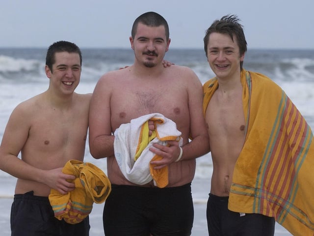 From left, Tom Hamlyn, Tom Dixon, and Eoin Noble. (0301PG17) : Culdaff New Year's Day Swim in 2006.