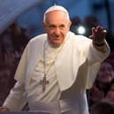 RIO DE JANEIRO, BRAZIL - JULY 26:  Pope Francis waves from the Popemobile on his way to attend the Via Crucis on Copacabana Beach during World Youth Day celebrations on July 26, 2013 in Rio de Janeiro, Brazil. More than 1.5 million pilgrims are expected to join the pontiff for his visit to the Catholic Church's World Youth Day celebrations which is running July 23-28. (Photo by Buda Mendes/Getty Images)