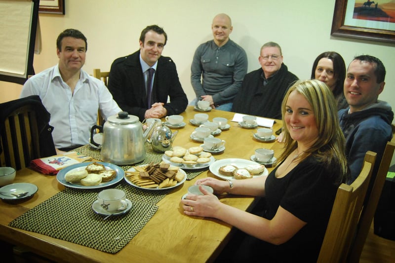 A coffee morning held at Francis Street accommodation centre earlier this week to highlight the plight of homelessness amongst young people in Derry. Seated from left to right are, Adrian Kehoe (Project Manager Francis Street), SDLP Derry City Councillor Mark H Durkan, Liam McLaughlin (Floating Support Officer - YASP), Sinn Fein councillor Tony Hassan, Louise Montgomery (Manager Strand Foyer - Apex Housing), Stephen Clarke (Mental Health Resettlement Officer - First Housing Aid) and Sandra Duffy (Project Manager - YASP). (HC1912AQ01) 