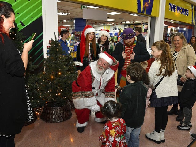 Santa arrives at the Richmond Shopping Centre on Sunday afternoon. Photo: George Sweeney