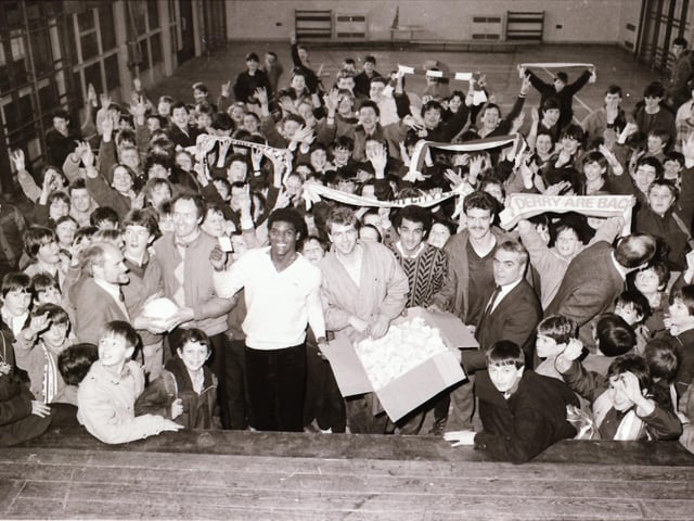 Derry City FC players attend a raffle at St Joseph's.