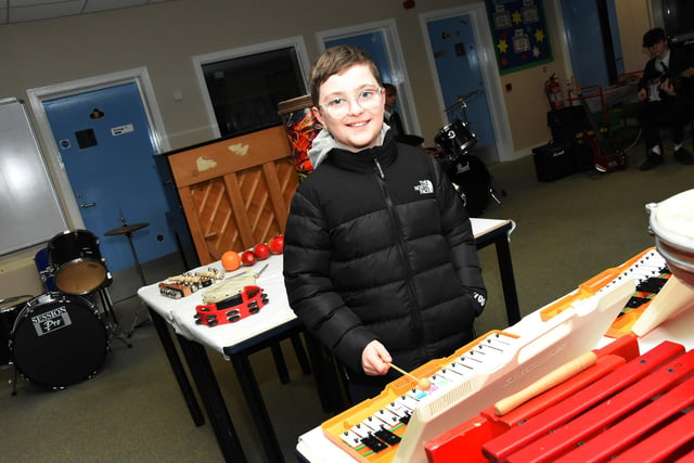 St Patrick's Primary School Pupil, Bobby seeing what the Music Department at Oakgrove College has to offer.