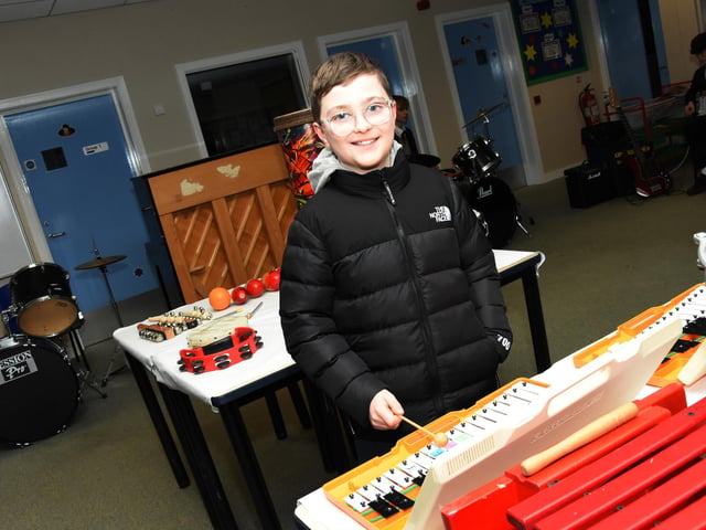 St Patrick's Primary School Pupil, Bobby seeing what the Music Department at Oakgrove College has to offer.