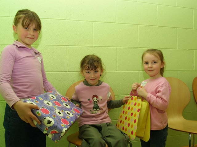 Tara Platt, Rachaell Hepburn, Chloe Boyd checking out the presents during the party