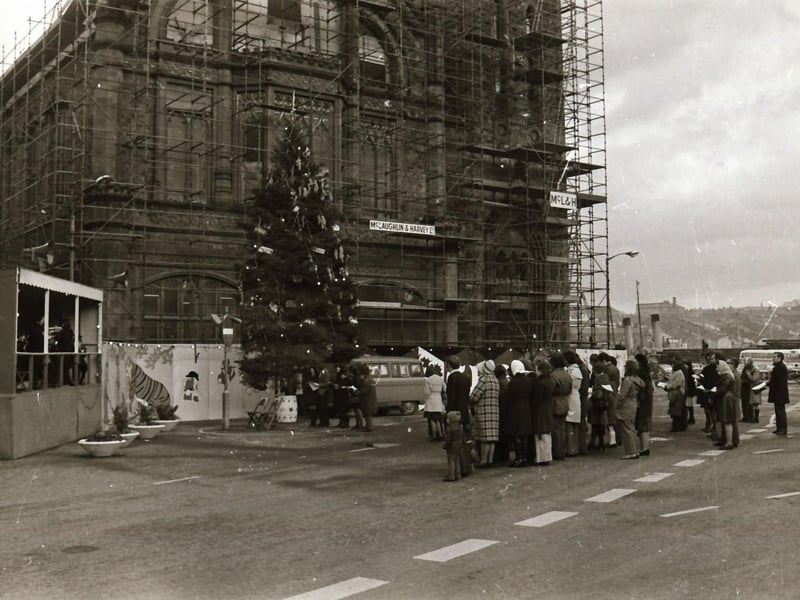 Interdenominational Christmas carols for peace outside the Guildhall in December 1974.