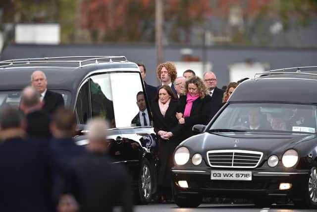 Family members follow the two hearses as the funerals of Robert Garwe, aged 50 and his daughter Shauna Flanagan Garwe, aged 5 take place on October 15, 2022 at St. Michaels Church, Cresslough in Donegal, Ireland. Ten people died when an explosion ripped through the Applegreen service station in the County Donegal village of Creeslough. Shauna Flanagan Garwe who was the youngest victim of the tragedy had called into the Applegreen shop with her father after school to buy a birthday cake for her mother. Shauna's uncle Killian Flanagan has said that when they were found, Robert had his arms around his little girl.  (Photo by Charles McQuillan/Getty Images)