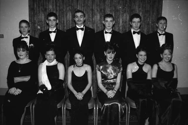 Seated, from left, Arlene McClements, Michelle Dunne, Kerry Duddy, Gillian Harkin, Aisling McClelland and Michaela Gibbons. Standing, from left, Michael Dunne, Brendan Quinn, Paul Taylor, Tommy McMullan, Conor Duffy and Fintan Doherty, at the St. Brigid's High School Formal in January 1998.