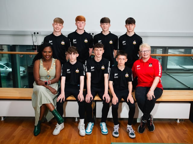 Derry City & Strabane District Council Mayor Lilian Seenoi-Barr and Tyrone Club Secretary Mavis Donaghy pictured with District boys Eoin McGurgan, Chrissy Spratt, Jayme Lafferty, Harley Patton, Cead McGrath, Ruairi Tinney, and Daniel Sweeney at the launch of the Super Cup in The Alley Theatre.