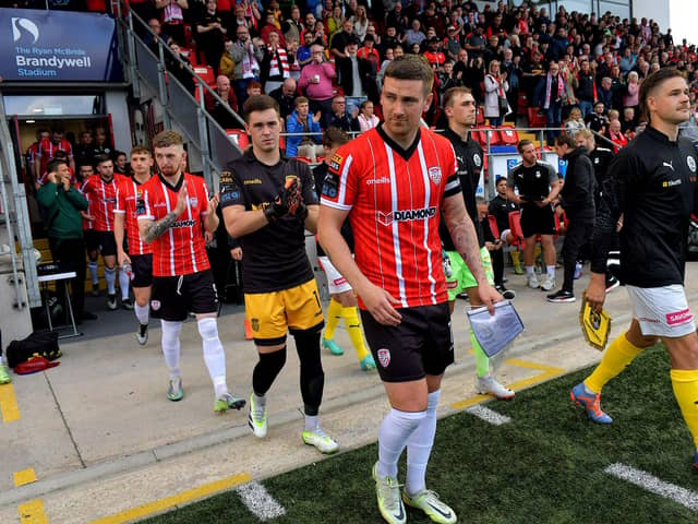 Captain Patrick McEleney, leads out the Derry City team at the Brandywell Stadium on Thursday evening. Photo: George Sweeney. DER2330GS -