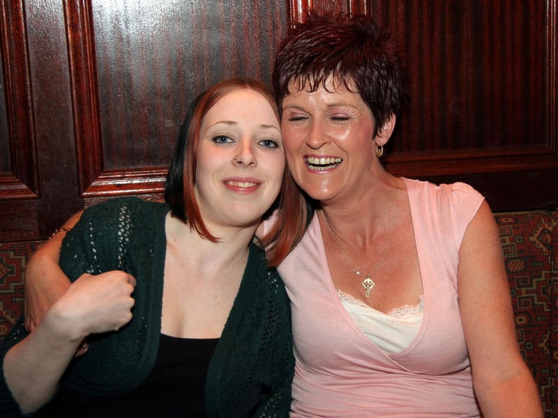 Emma and Julie enjoy the craic at the fundraising night in aid of the Northlands 0599JML : Parties and celebrations June 2006: Northlands Fundraiser.