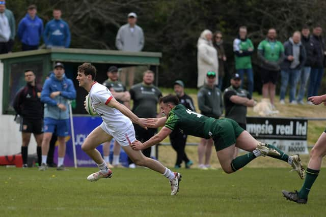 Ulster’s Michael Orr evades a tackle from Connacht’s Barry Walsh. Photo: George Sweeney