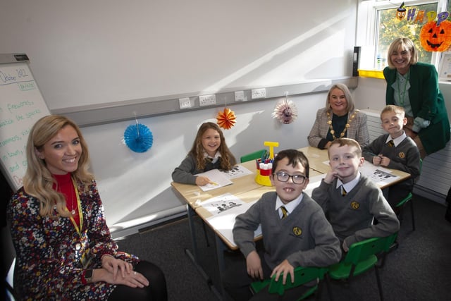 Children taking part in The Engage Programme with their teacher Miss Kathryn Green pose for a photograph with the Mayor, Sandra Duffy during her visit. Included on right is Mrs. Michelle Ramsey, Principal. (Photos: Jim McCafferty Photography)