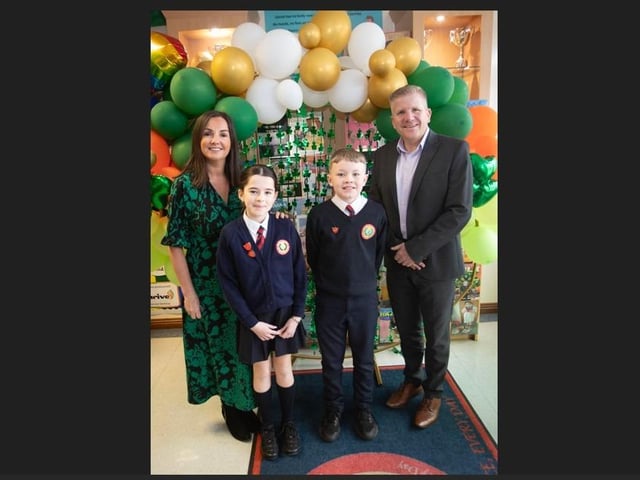 The Children's Commissioner Mr. Chris Quinn being welcomed to Holy Child PS on Thursday by Mrs. Pat Concannon, Principal and Deputy Head Girl Daisy McGilloway and Head Boy Cayden Wright.