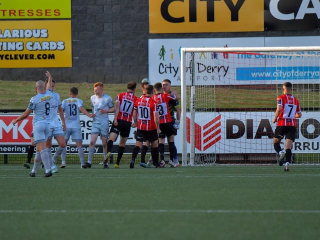 Derry City keeper Brian Maher is congratulated by team mates after saving a first half penalty from Shelbourne's Shane Farrell. Photo: George Sweeney. DER2321GS -