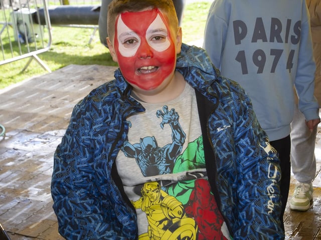 Young Shea Dobbins poses for a photo at Saturday’s Fun Day at Bull Park.