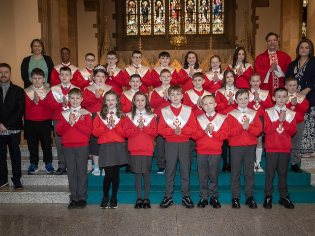 Pupils from St. Eugene's Primary School who received the Sacrament of Confirmation from Fr. Shaun Doherty at St. Eugene's Cathedral on Thursday last. Included in photo are Mrs Áine Deane, Vice Principal, Ms Ciara Herron, teacher and Mr Conall McElhinney, Classroom Assistant. (Photo: Jim McCafferty Photography)