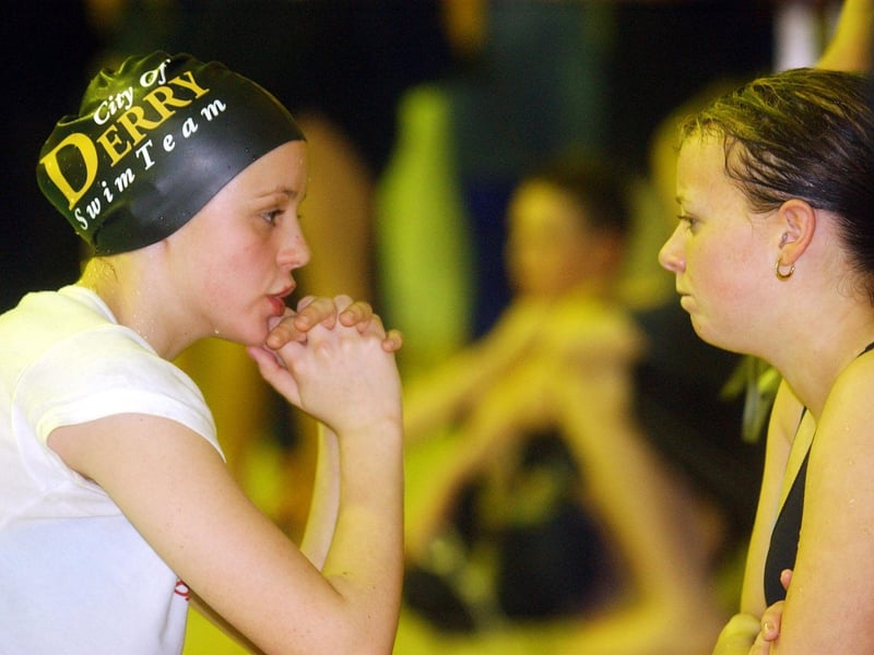 TEAM TALK. . . .City of Derry swimmers, Caoimhe Reuters, and Lyndsay Rodgers, discuss team tactics during the City of Derry Swimming Gala. (2101A17)