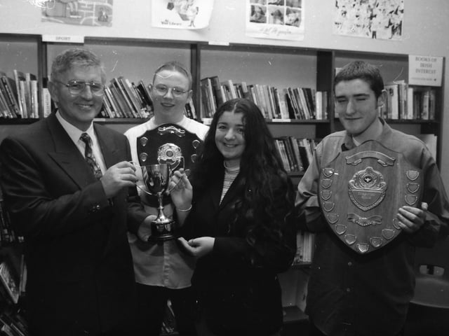 Paul Molloy, principal, St. Brecan's High School, presenting the Mathematics Award to Laura Webb. Included are Gary McDermott (Science Single Award) and Patrick McCay (Science Double Award).