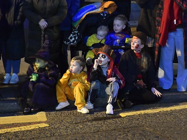Spectators pictured at the ‘City of the Bones’ Halloween carnival parade on Friday evening. Photo: George Sweeney