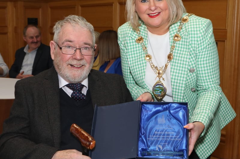 Mayor Sandra Duffy making a presentation to Maurice Harron, in recognition of his contribution as an art educator and artist in the City and District at a civic reception held in the Guildhall. (Photo - Tom Heaney, nwpresspics)