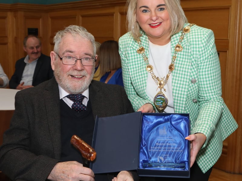 Mayor Sandra Duffy making a presentation to Maurice Harron, in recognition of his contribution as an art educator and artist in the City and District at a civic reception held in the Guildhall. (Photo - Tom Heaney, nwpresspics)