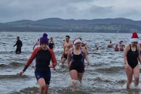 Christmas Day dippers at the annual swim at Ludden beach, Buncrana, County Donegal.