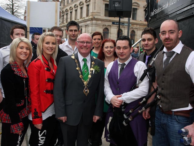 The Mayor of Derry Councillor Kevin Campbell, meeting members of Sontas, before they went on stage to perform at in Guildhall Square during the St. Patrick’s Day celebrations on Sunday.