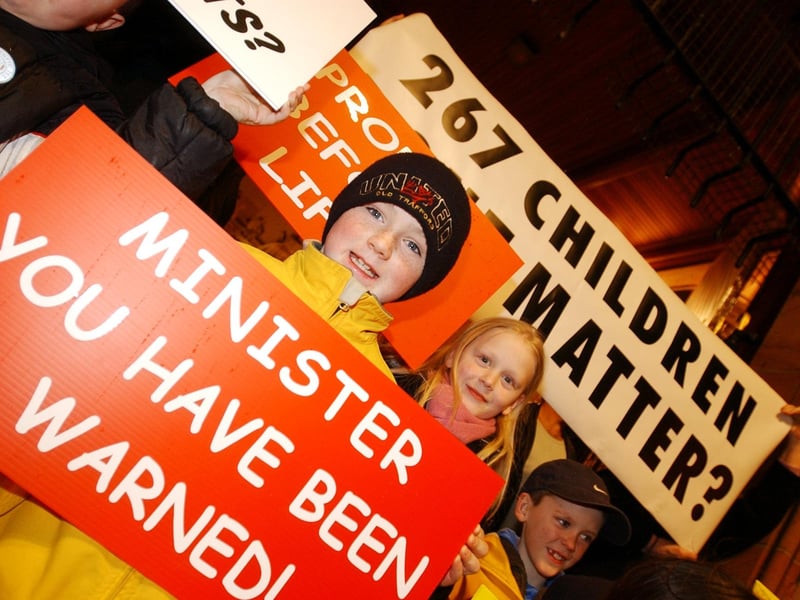 Some of the children pictured at the demonstration at Derry's Guildhall by residents of Grangemore protest against the access road to the proposed development of a further 600 houses.