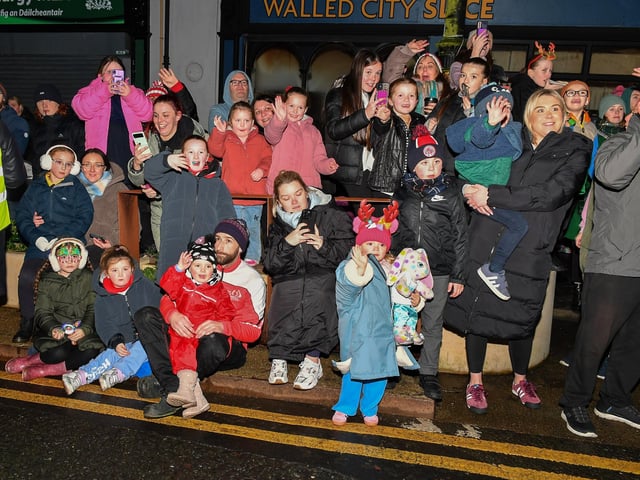 Families at the Derry Magical Christmas procession on Friday evening. Photo: George Sweeney