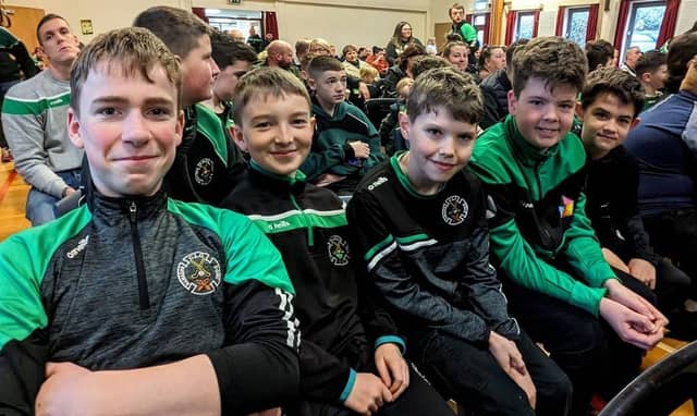 Na Magha youngsters waiting in anticipation ahead of the start of the annual awards presentation night.
